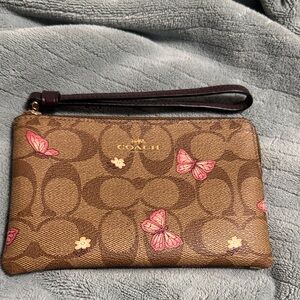 Coach Tan Wristlet with Pink Butterfly Design